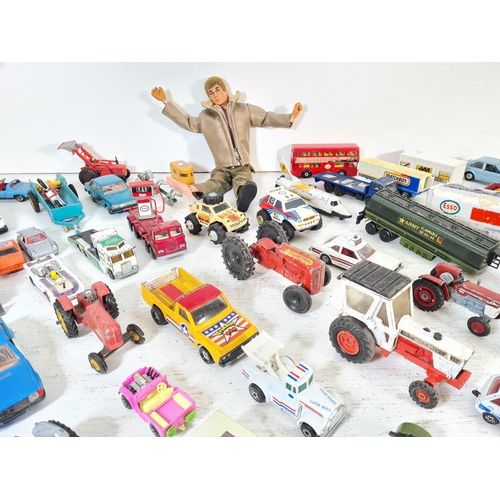 74A - A collection of assorted vintage diecast model vehicles and toys to include Action Man figurine with... 