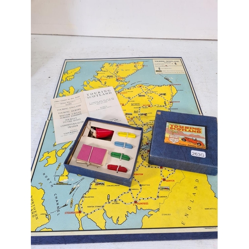 89 - A collection of vintage boxed games to include Geographia Ltd Touring Scotland map game, Marx Knight... 