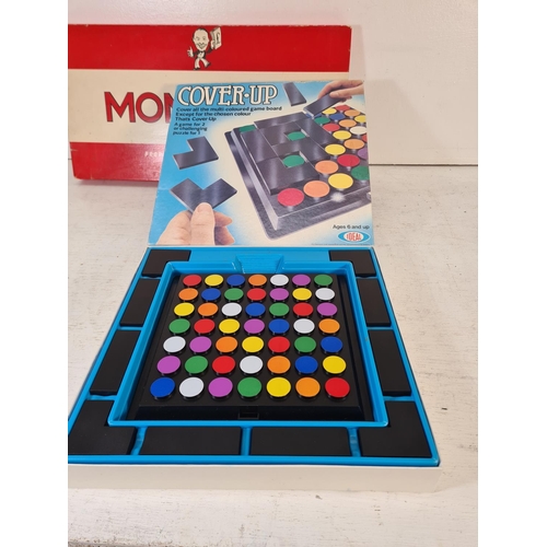 90 - A collection of assorted boxed toys and games to include Monopoly, Chinese chess, Cover Up, Take The... 