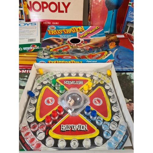 90 - A collection of assorted boxed toys and games to include Monopoly, Chinese chess, Cover Up, Take The... 