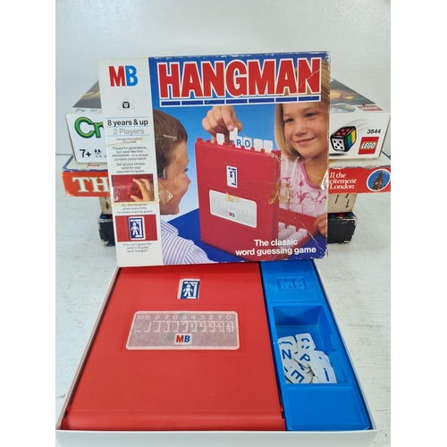 91 - A collection of assorted boxed toys and games to include The Balancing Chairs game, Hangman, Skim-a-... 