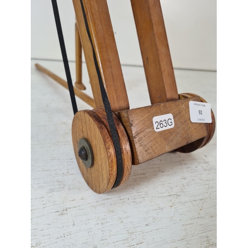 92 - A mid/late 20th century scratch built wooden push along acrobatic toy - approx. 26cm high x 14cm wid... 