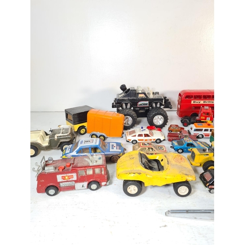 93 - A collection of assorted model vehicles to include Tonka yellow metal beach buggy, Tonka military Je... 