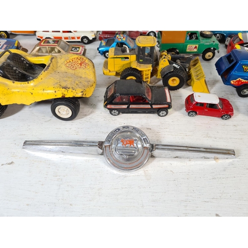 93 - A collection of assorted model vehicles to include Tonka yellow metal beach buggy, Tonka military Je... 