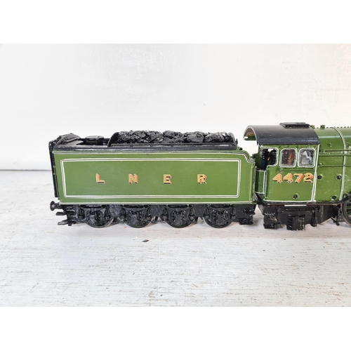 96 - A hand painted kit built O gauge Flying Scotsman model locomotive and tender - approx. 49cm long