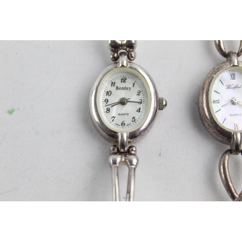 1083 - Two hallmarked sterling silver quartz women's wristwatches with mother of pearl dials, one Woodford ... 