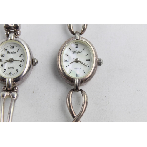 1083 - Two hallmarked sterling silver quartz women's wristwatches with mother of pearl dials, one Woodford ... 