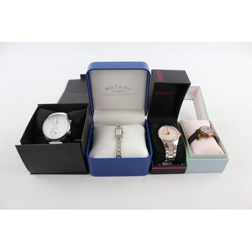 1084 - Four boxed quartz women's wristwatches to include Rotary, Seksy etc.