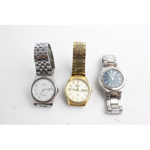 1096 - Three vintage Seiko men's quartz wristwatches