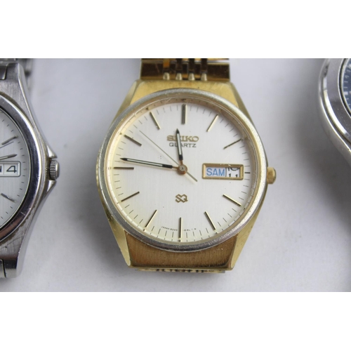 1096 - Three vintage Seiko men's quartz wristwatches