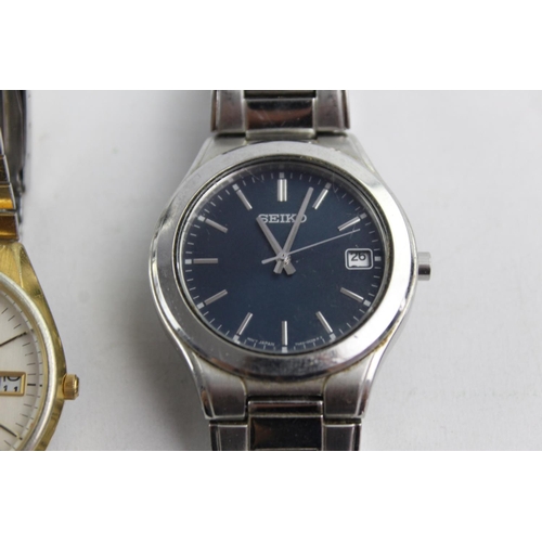 1096 - Three vintage Seiko men's quartz wristwatches