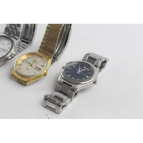 1096 - Three vintage Seiko men's quartz wristwatches