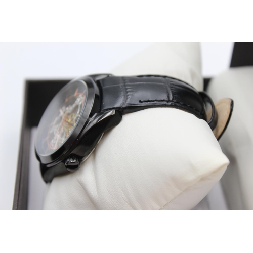 1101 - A boxed Rotary automatic skeleton men's wristwatch with original black leather strap