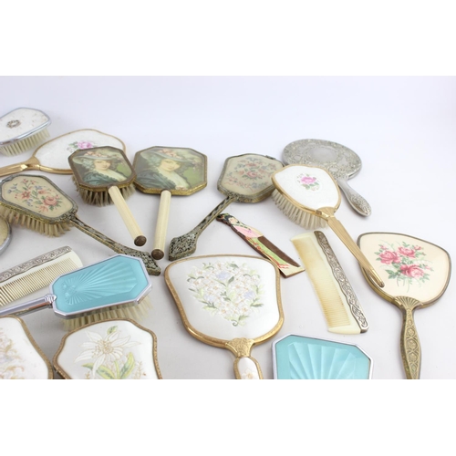 127 - Thirty assorted vintage vanity items to include mirrors, brushes etc.