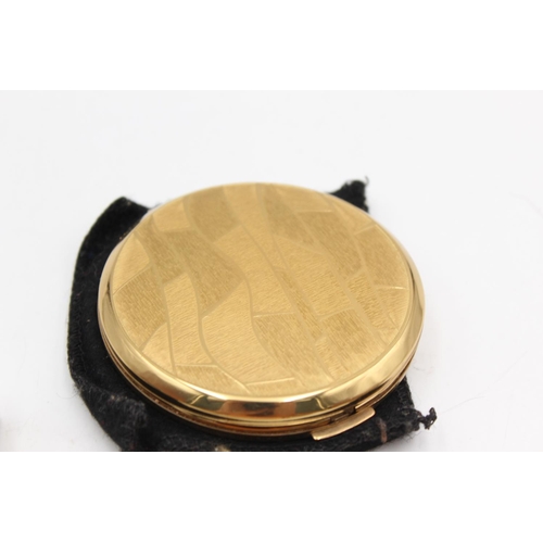 128A - Four vintage vanity compacts