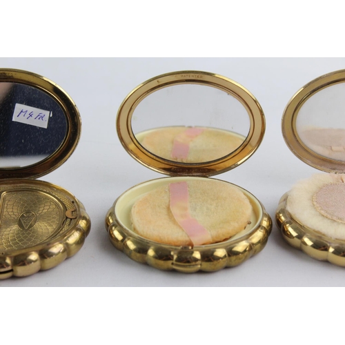 128B - Three vintage vanity powder compacts