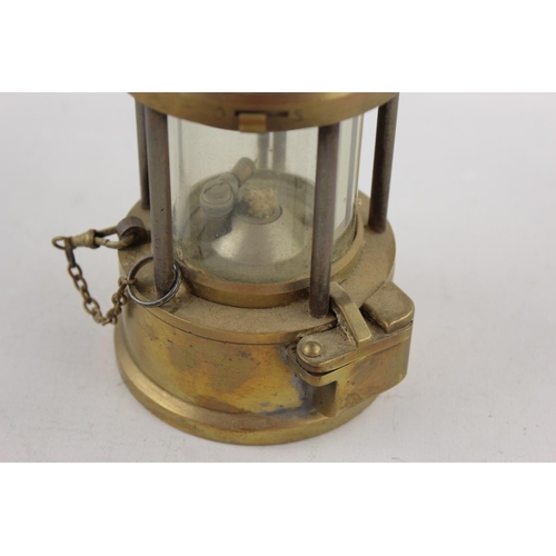 174 - A vintage The Protector Lamp & Lighting Ltd. Co. Eccles brass and steel paraffin miners lamp