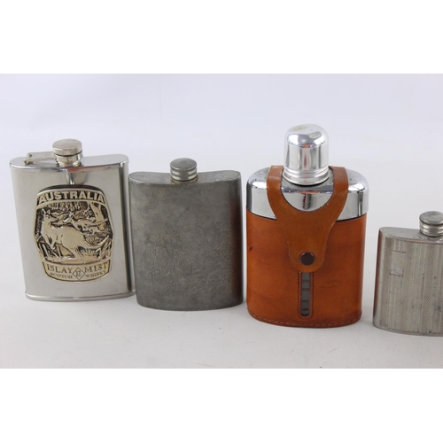 175 - Twelve assorted hip flasks to include boxed Sherrelle International, leather etc.