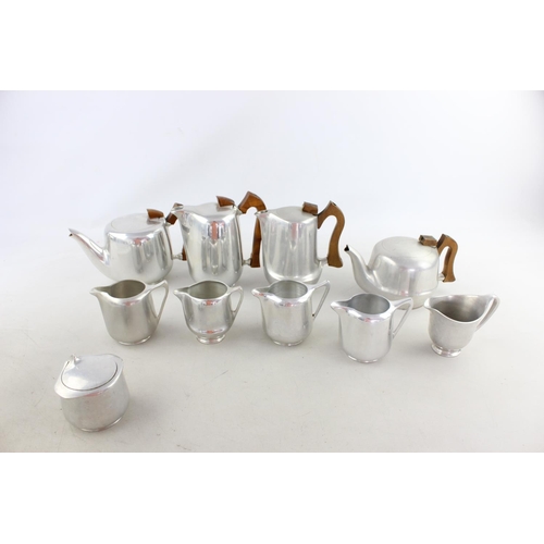 66 - A vintage ten piece picquot ware tea set