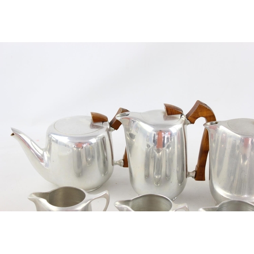 66 - A vintage ten piece picquot ware tea set