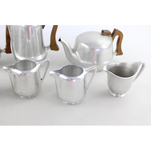 66 - A vintage ten piece picquot ware tea set