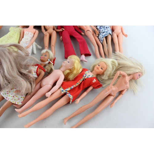 82 - A collection of assorted dolls to include Barbie, Bionic Woman, Tressy, Clones etc.