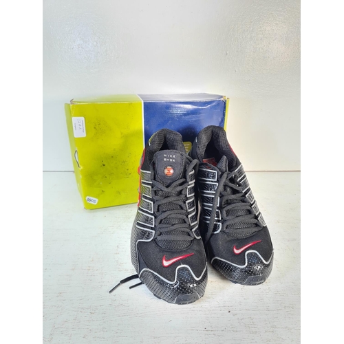 124a - A pair of Nike Shox size 11 men's trainers