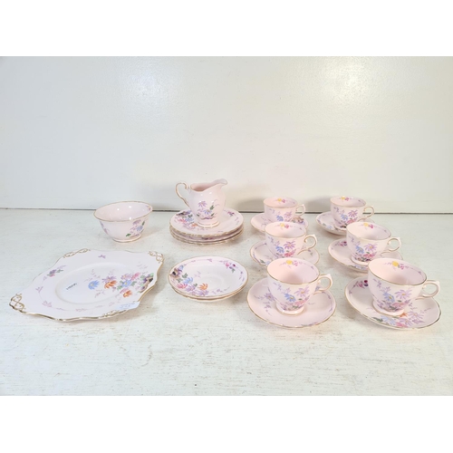 49A - A Tuscan hand painted bone china twenty two piece teaset comprising six teacups, eight saucers, five... 