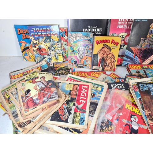 140 - A collection of assorted calendars, books and magazines to include The Broons calendars, Science Fic... 