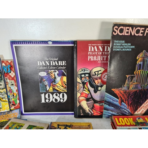 140 - A collection of assorted calendars, books and magazines to include The Broons calendars, Science Fic... 