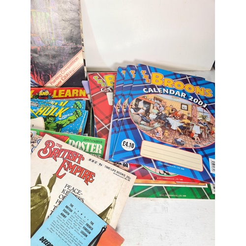 140 - A collection of assorted calendars, books and magazines to include The Broons calendars, Science Fic... 