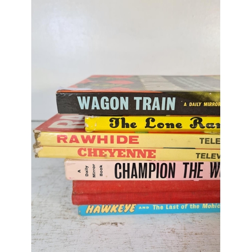 143 - Eight assorted vintage Western hardback books to include Wagon Train, The Lone Ranger annual, Rawhid... 