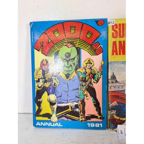 145 - Four assorted vintage annuals, two 1960s Superman, one 2000AD and one Captain Scarlett