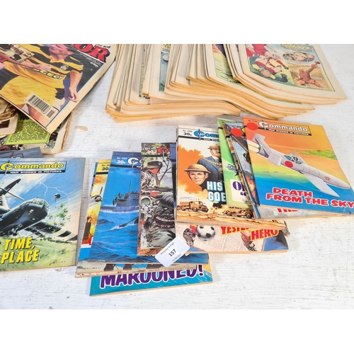 157 - A large collection of vintage Commando and Victor comics