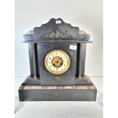 185 - A 19th century French slate mantle clock with enamel face and pair of slate and bronze garnitures