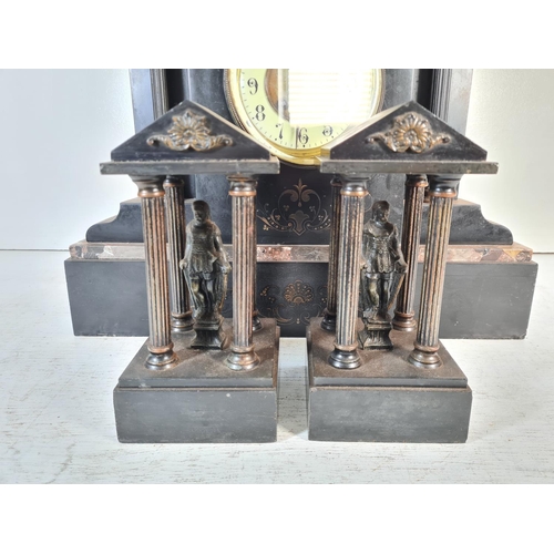 185 - A 19th century French slate mantle clock with enamel face and pair of slate and bronze garnitures