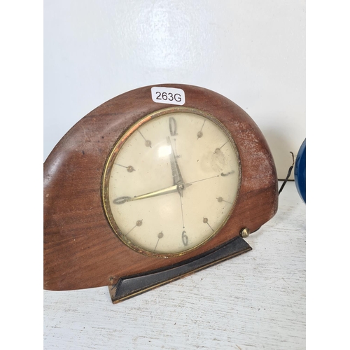 188 - Three vintage clocks comprising 1930's/40's Temco, mid 20th century Metamec electric and one Walt Di... 