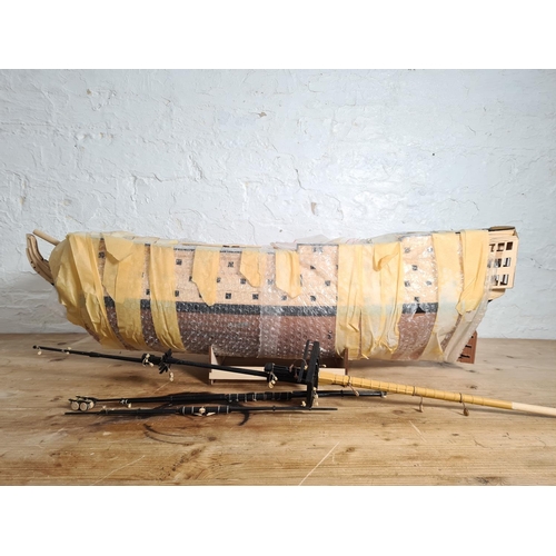 198 - Two scratch built wooden model ships on stands to include The Cutty Sark etc. - largest approx. 65cm... 