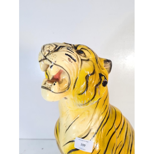 209 - A mid 20th century plaster tiger - approx. 50cm high