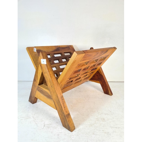 210 - A contemporary sheesham wood magazine rack - approx. 34cm high x 43.5cm long x 37cm deep