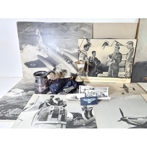 225 - A collection of various RAF related memorabilia to include oil on board portrait of an RAF pilot, si... 