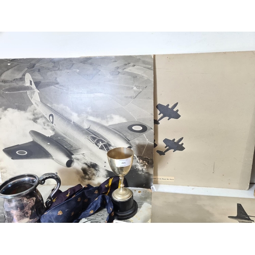 225 - A collection of various RAF related memorabilia to include oil on board portrait of an RAF pilot, si... 