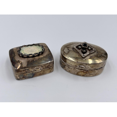 1226 - Two silver pill boxes, one oval Thai with diamond shaped marcasite top and one rectangular hallmarke... 