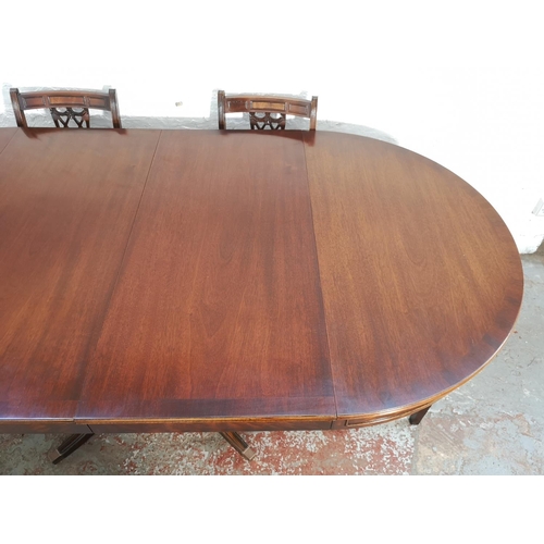 232 - A Bevan Funnell Reprodux mahogany extending pedestal dining table and six matching chairs - approx. ... 