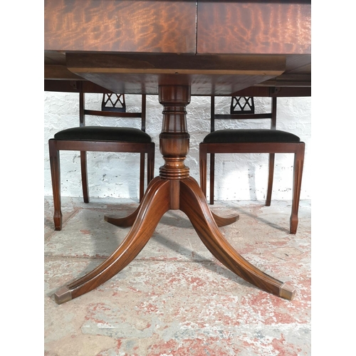 232 - A Bevan Funnell Reprodux mahogany extending pedestal dining table and six matching chairs - approx. ... 