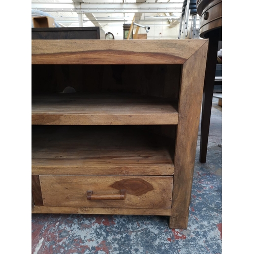 233 - An Indian sheesham wood TV stand with two lower drawers - approx. 60cm high x 100cm wide x 45cm deep