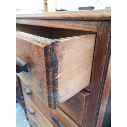 250 - A 1930s oak chest of five drawers - approx. 92cm high x 61cm wide x 44cm deep