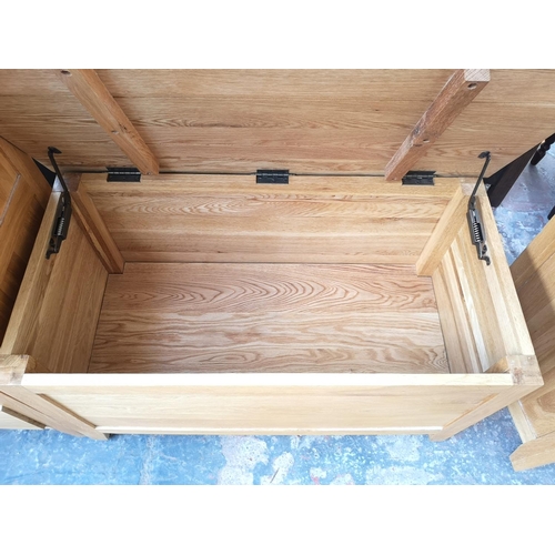 257 - A modern solid oak blanket box - approx. 50cm high x 90cm wide x 47cm deep