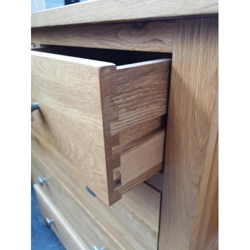 259 - A modern solid oak chest of two short over three long drawers - approx. 97cm high x 84cm wide x 43cm... 