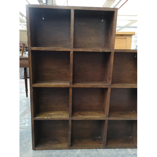 260 - A modern pine fifteen section shelving unit - approx. 107cm high x 120cm wide x 12cm deep